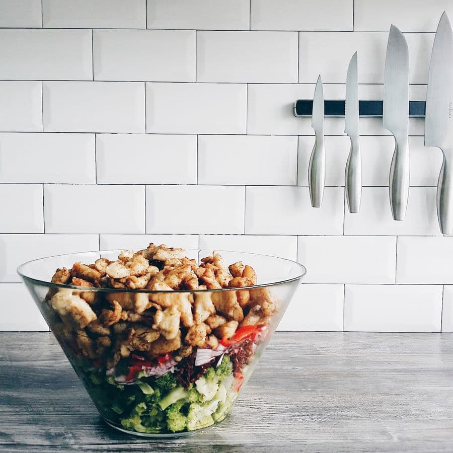 Fresh salad bowl in kitchen